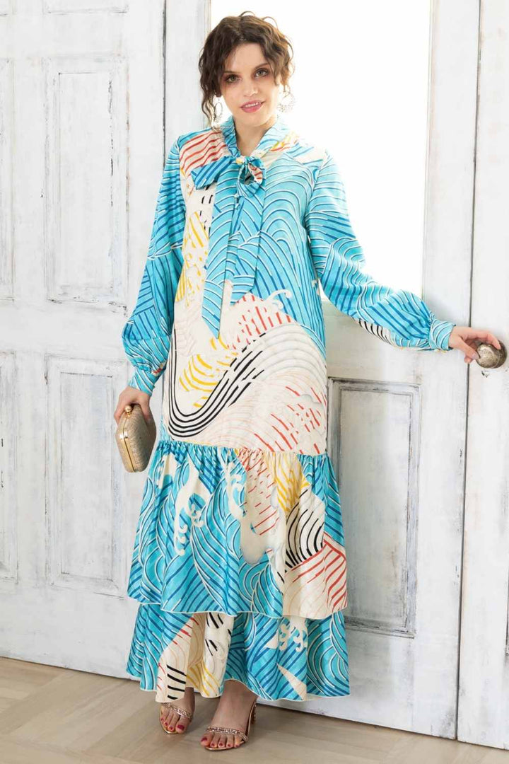 A woman is wearing a wedding guest dress which is also a silk wedding guest dress, showcasing her impeccable style in a stunning fall wedding guest outfit. This long-sleeve party dress, ideal for any special occasion, embodies elegance and sophistication, making her the epitome of grace and charm. Whether it's a tea party dress with delicate details or a chic cocktail dress that exudes confidence, her choice of wedding guest clothes reflects her fashion-forward sensibilities.