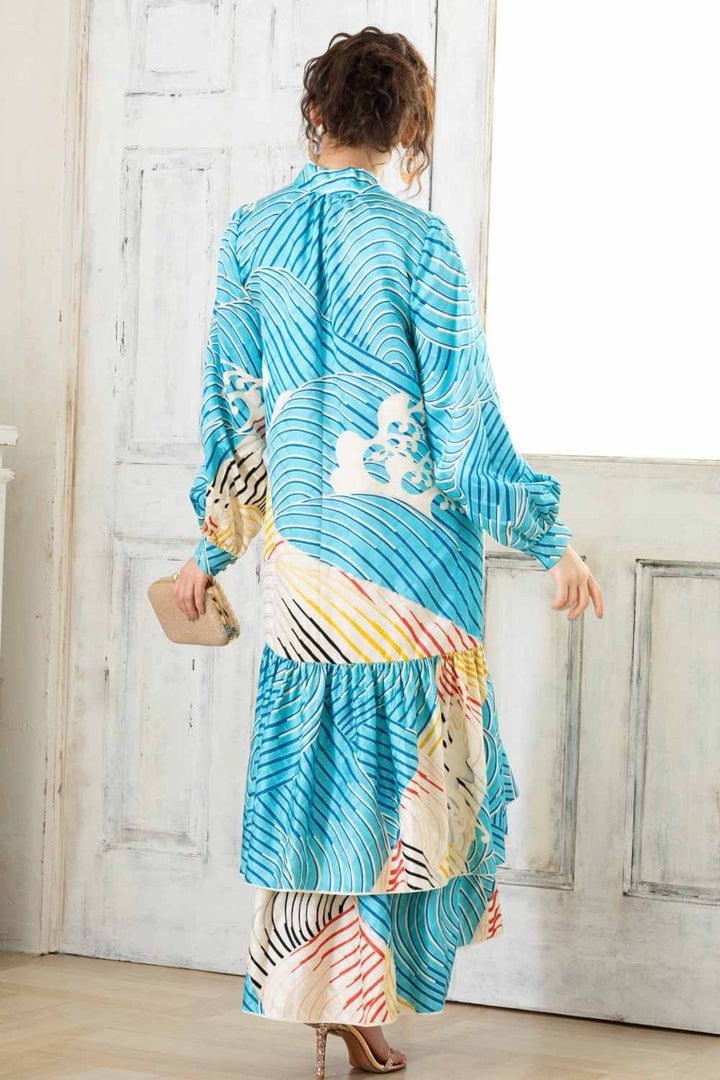 A woman is wearing a wedding guest dress which is also a silk wedding guest dress, showcasing her impeccable style in a stunning fall wedding guest outfit. This long-sleeve party dress, ideal for any special occasion, embodies elegance and sophistication, making her the epitome of grace and charm. Whether it's a tea party dress with delicate details or a chic cocktail dress that exudes confidence, her choice of wedding guest clothes reflects her fashion-forward sensibilities.