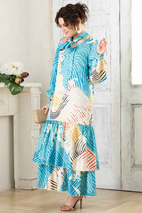  A woman is wearing a wedding guest dress which is also a silk wedding guest dress, showcasing her impeccable style in a stunning fall wedding guest outfit. This long-sleeve party dress, ideal for any special occasion, embodies elegance and sophistication, making her the epitome of grace and charm. Whether it's a tea party dress with delicate details or a chic cocktail dress that exudes confidence, her choice of wedding guest clothes reflects her fashion-forward sensibilities. 